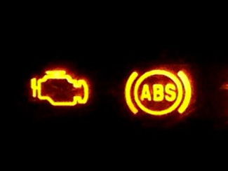（左）エンジン警告灯、（右）ABS警告灯